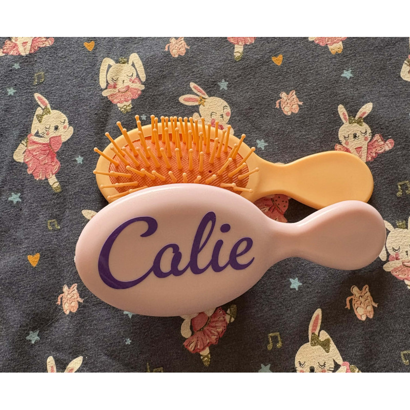 Brosse à cheveux rose
