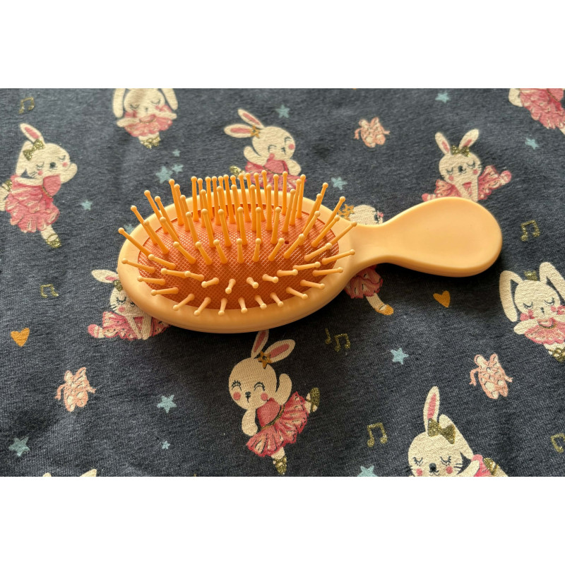 Brosse à cheveux orange